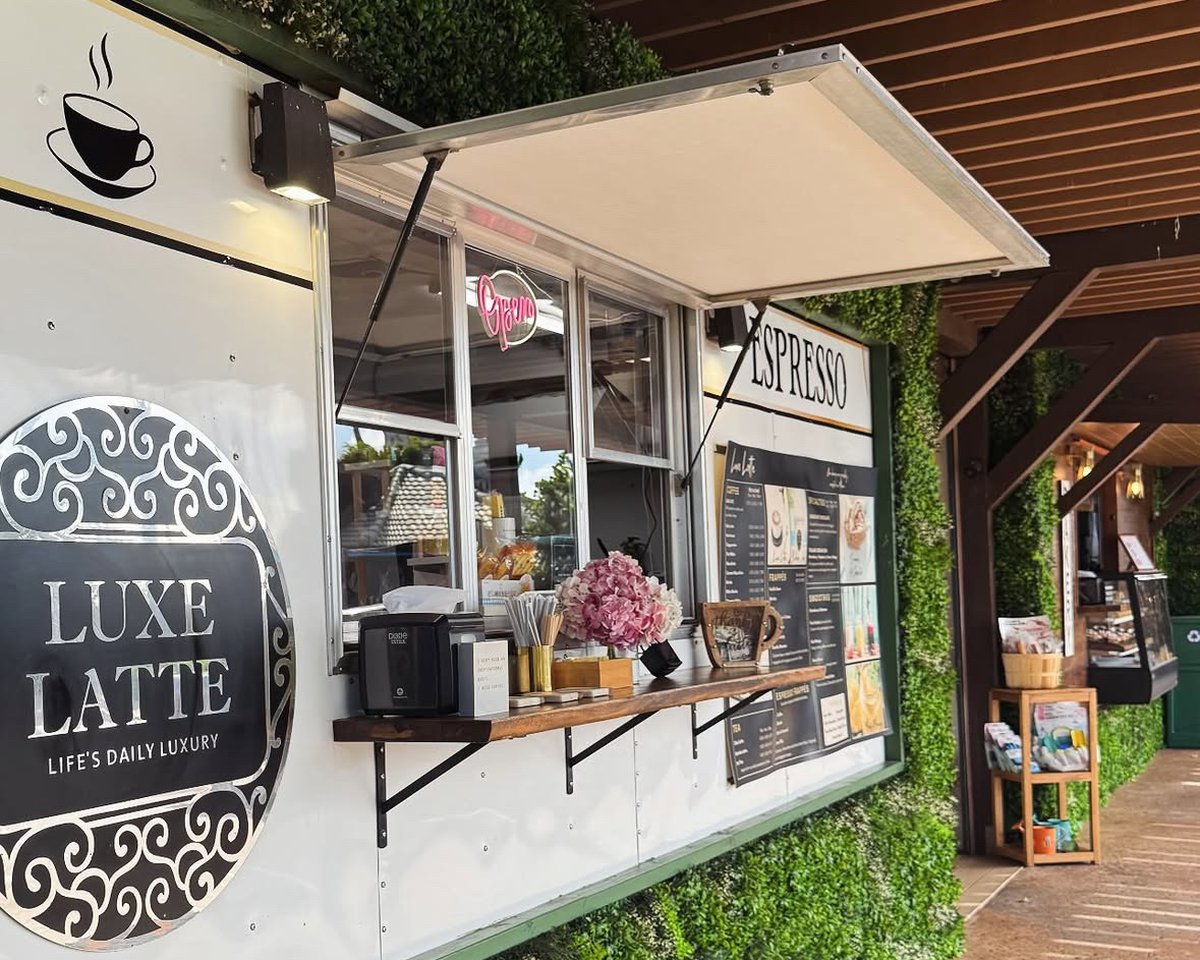 The Luxe Latte espresso window, with its menu board and pastry case